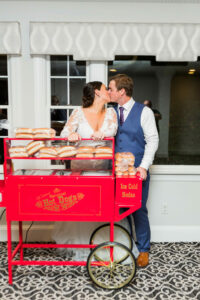 Bride and Groom With Hot Dog Cart at Wedding