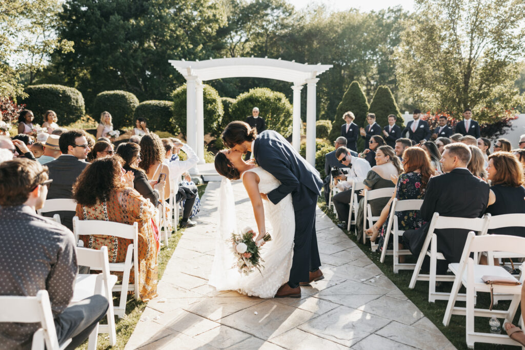 The Villa – The Tent | Outdoor Wedding Ceremony Recessional Kiss | In Our Image Photography