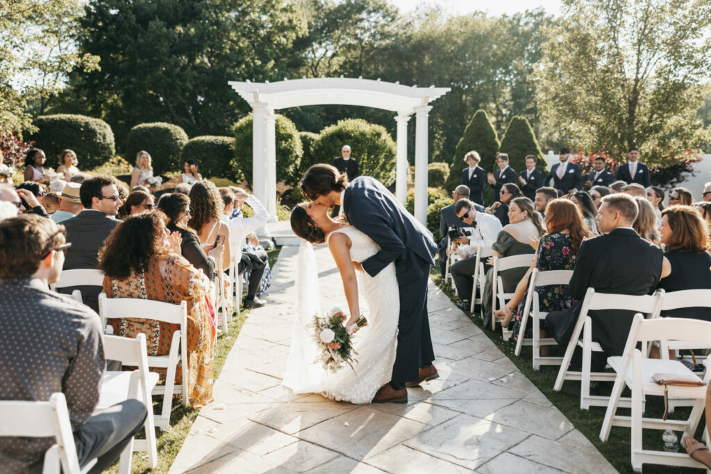 The Villa – The Tent | Outdoor Wedding Ceremony Recessional Kiss | In Our Images Photography