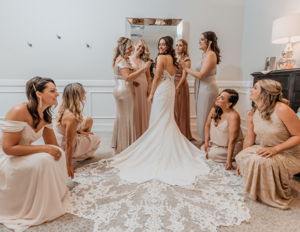 Avenir | Bridesmaids in Champagne Dresses Getting Ready in Bridal Suite