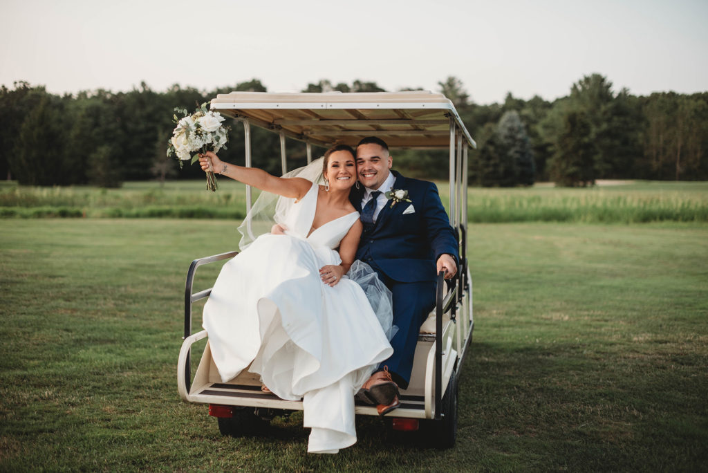 The Villa – The Tent | Bride and Groom on Golf Cart | East Passage Photography