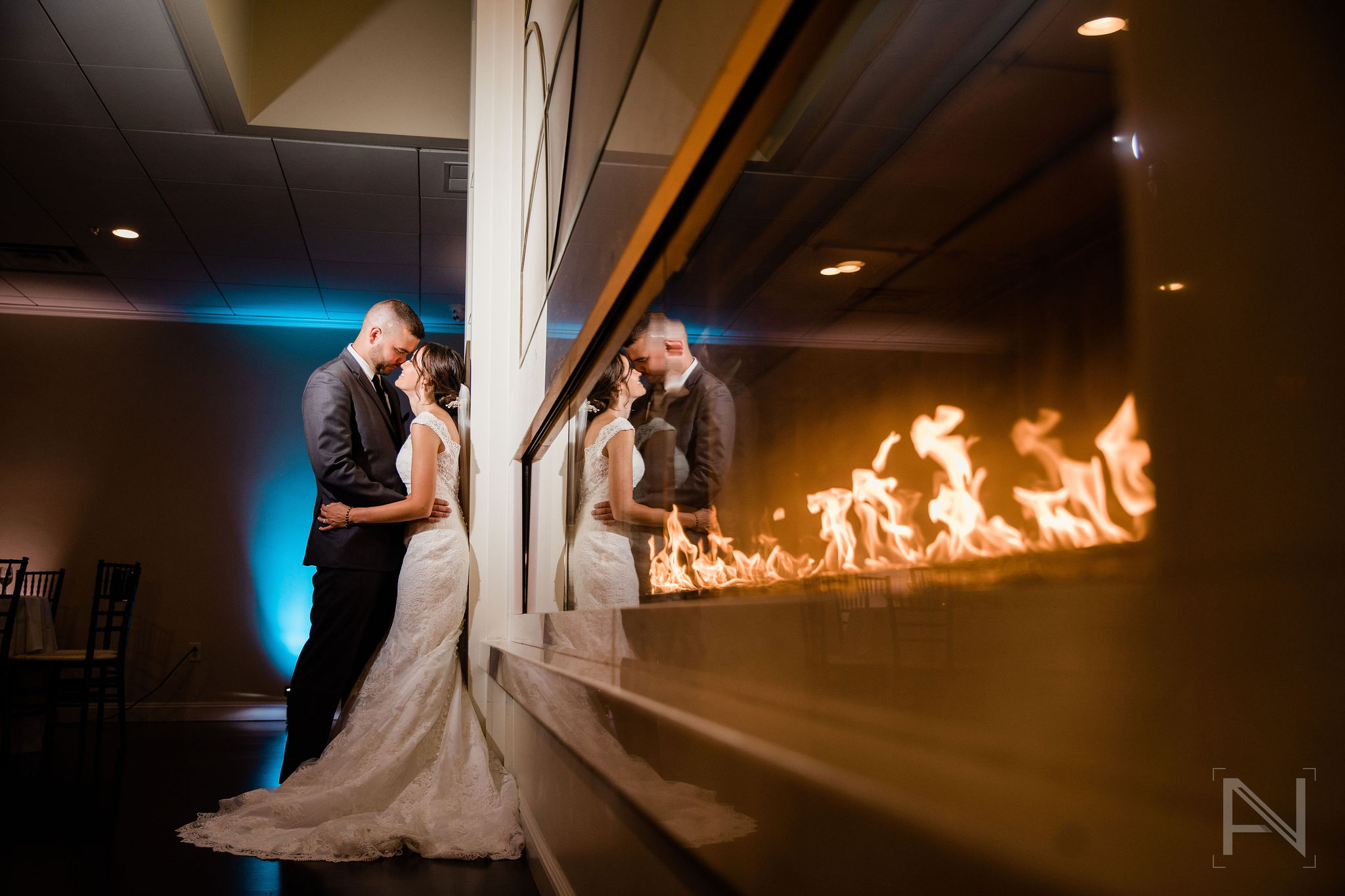 Wedding Couple in Front of Fireplace | Anthony Niccoli Photography