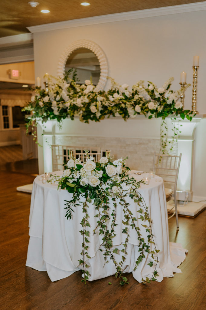 Saphire Estate | Saphire Estate Sweetheart Table in Front of Fireplace | Bold As Love Studios