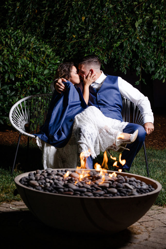 The Villa – The Tent | A Kiss at the Outdoor Firepit | Danyel Stapleton Photography