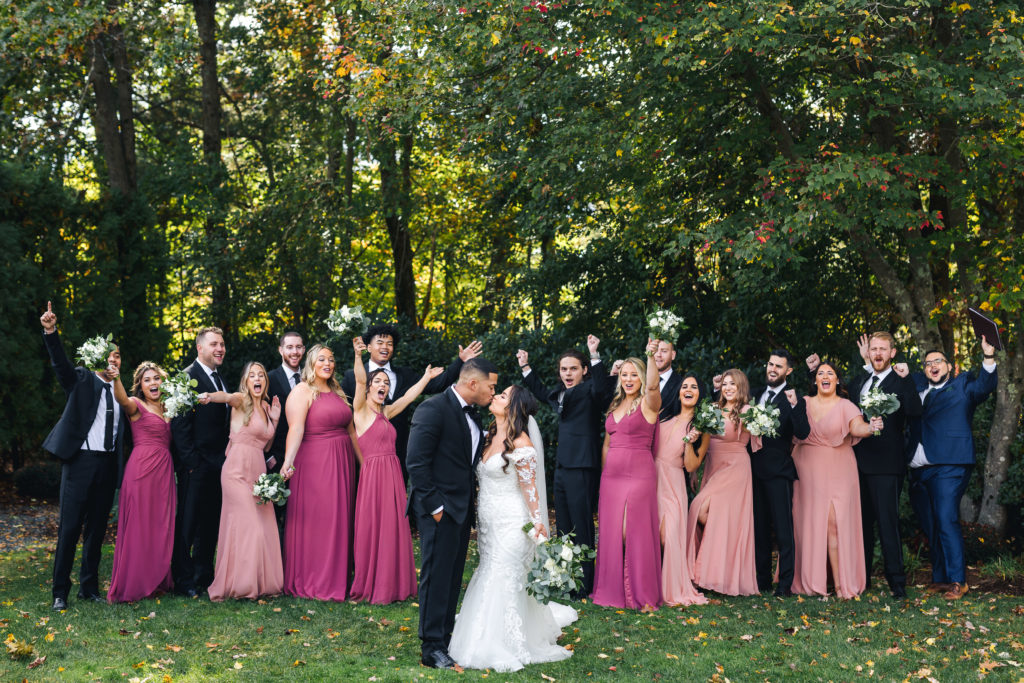 Avenir | Wedding Party in Different Shades of Pink with Hands Up