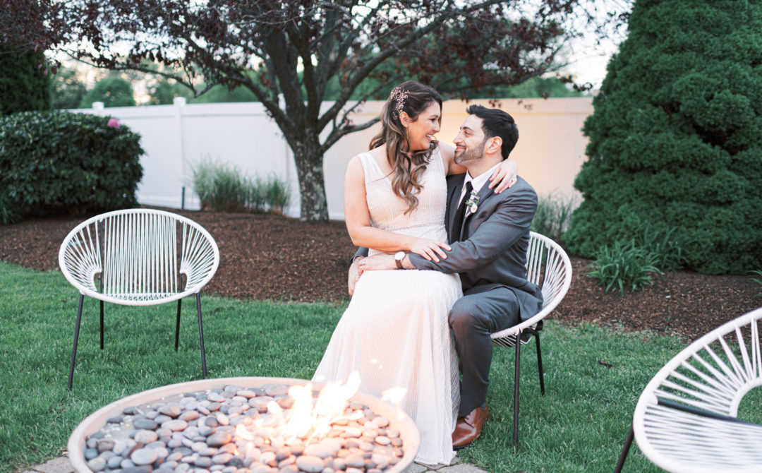 Wedding Couple Sitting by Fire Pit | Stephanie Vegliante Photography