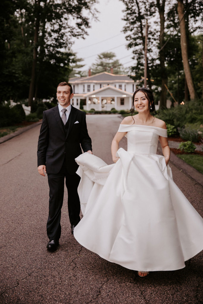 Bride and Groom Walking Outside Saphire Estate | Move Mountains Co.