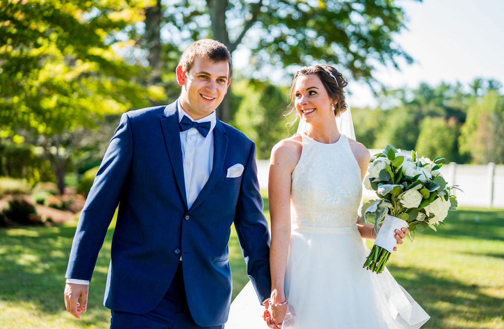 bride and groom walking portrait