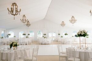 White Tent Venue Drapery and Chandeliers 