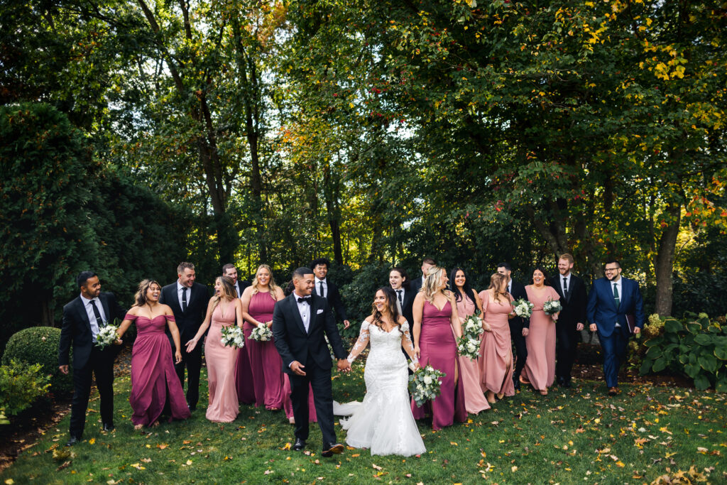 Wedding Party Walking Outside among Fall Leaves at Avenir near Foxborough, Massachusetts