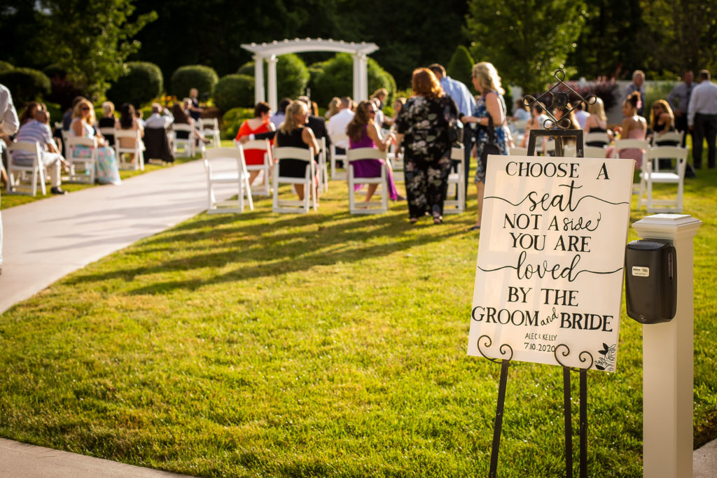sign at massachusetts covid wedding