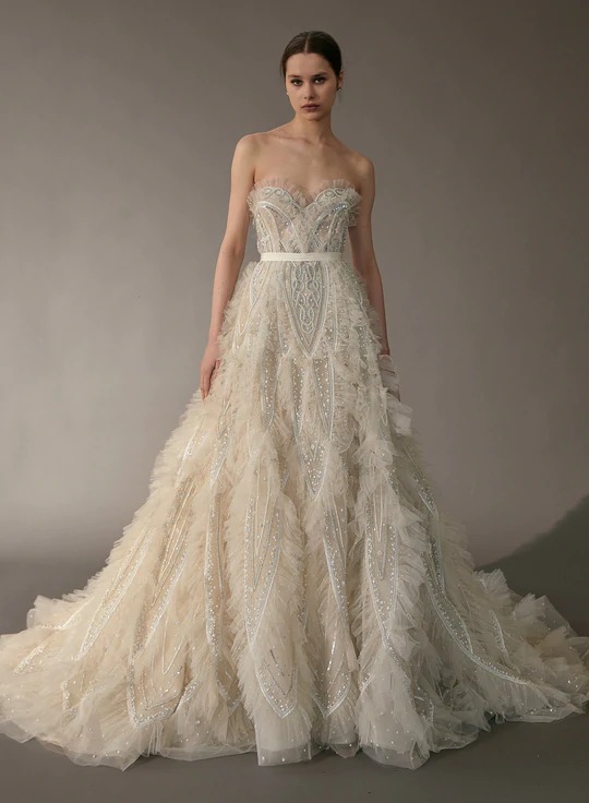Bride modeling a Spring 2023 Bridal Fashion Week dress from Elie Saab