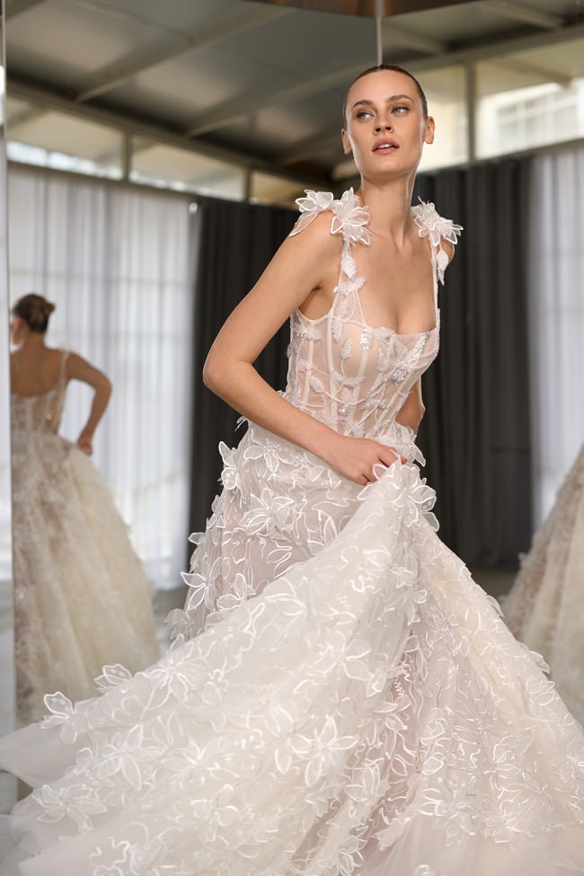 bride modeling a 2023 Dana Harel wedding dress from Bridal Fashion Week 2023