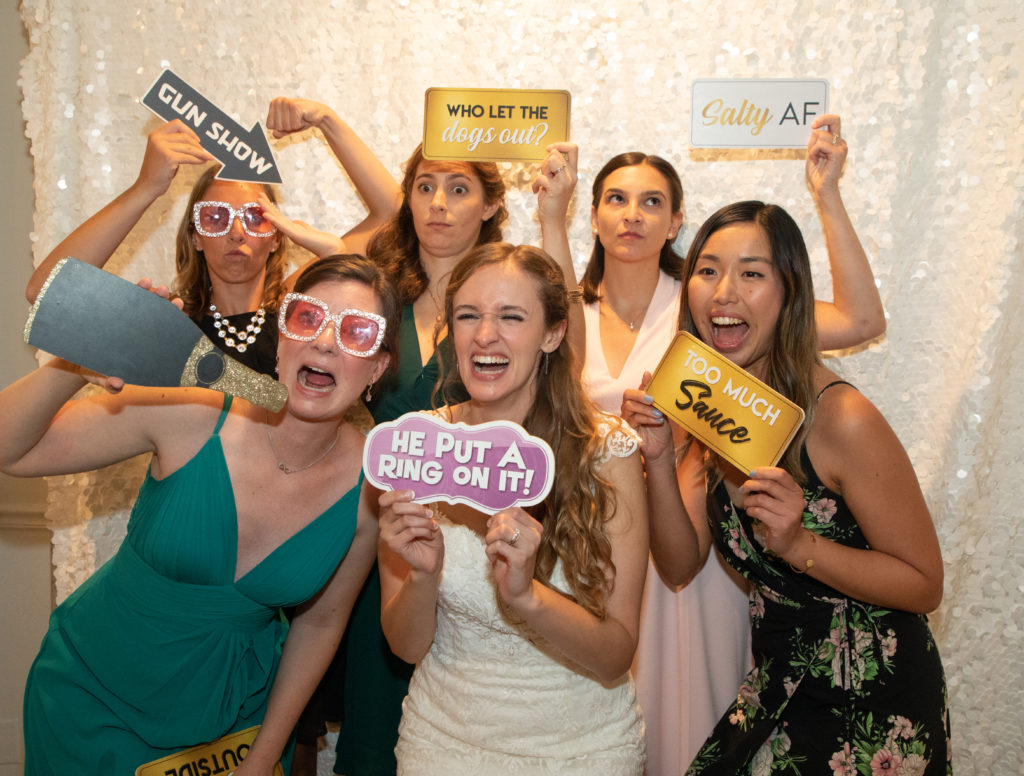 Bride and Bridesmaids Using Photo booth with props and masks