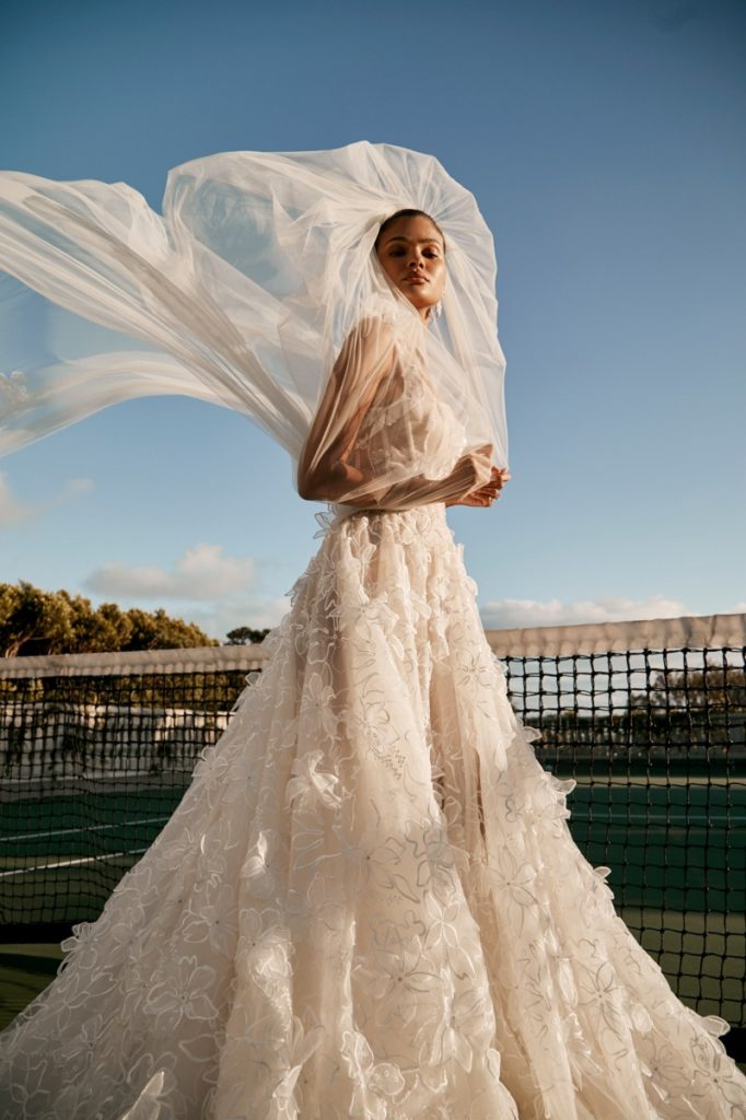 Bride modeling a Galia Lahav design dress with texture from Bridal Fashion Week 2023