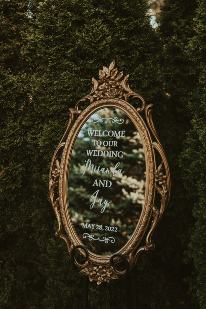 Wedding signage decor for outdoor ceremony at The Villa in East Bridgewater, Massachusetts