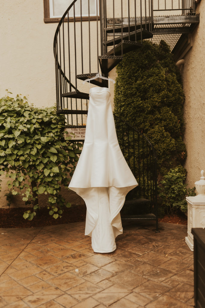 Wedding gown outside bridal suite at The Villa in East Bridgewater, Massachusetts