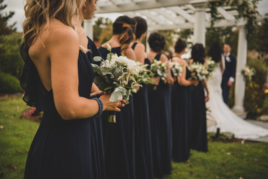 Bridesmaids in outdoor wedding reception at the Villa in East Bridgewater, Massachusetts