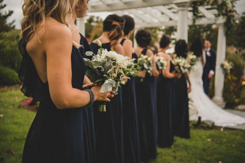Bridesmaids in outdoor wedding reception at the Villa in East Bridgewater, Massachusetts