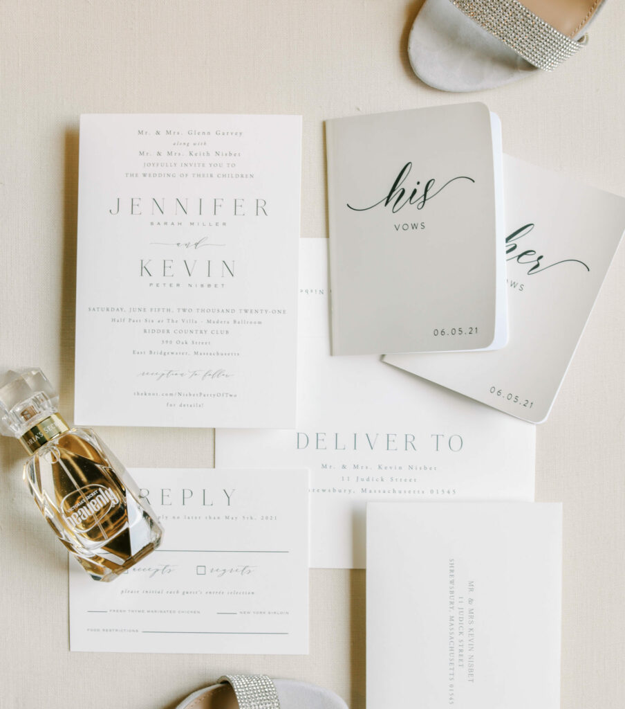 Wedding details showcasing stationary, shoes, and a wedding day perfume