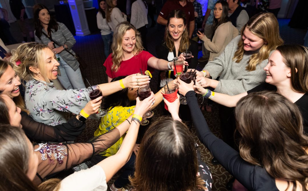 Saphire Event Group employees making a toast at employee appreciation party at The Villa in East Bridgewater Massachusetts