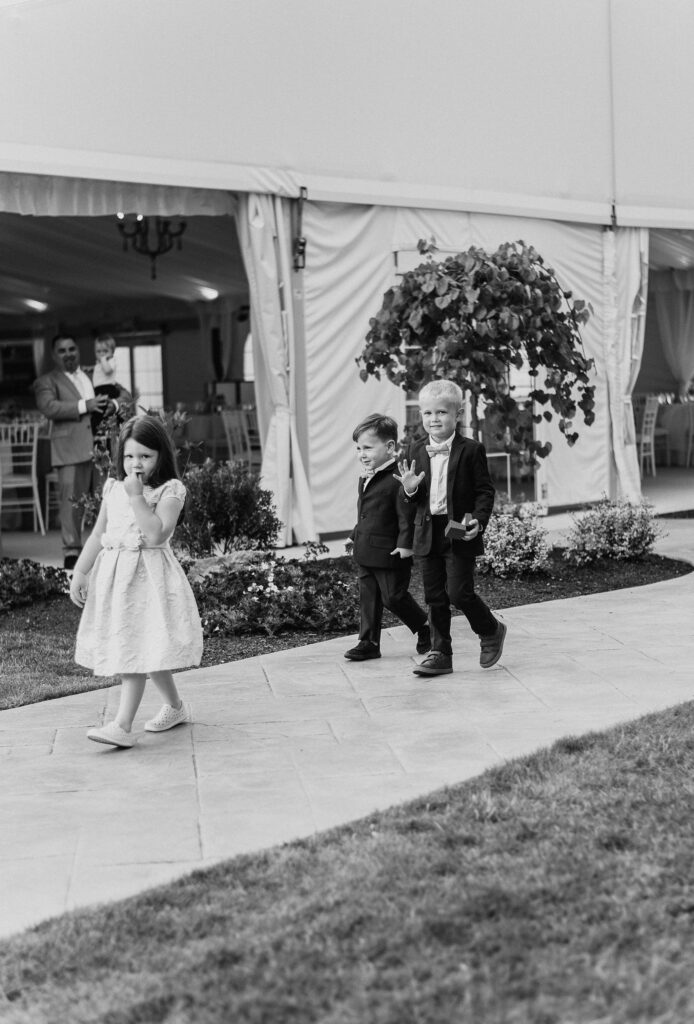 Children Walk Down the Aisle at Outdoor Wedding