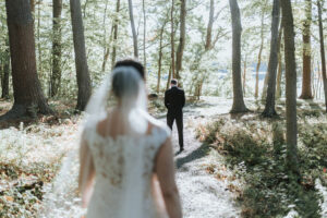 Bride and Groom First Look in the Woods by Saphire Estate