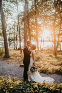 Bride and Groom During Golden Hour in Woods at Saphire Estate
