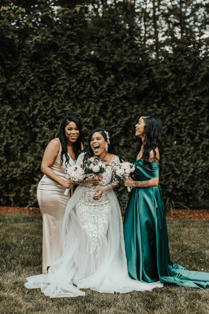 Bride and Bridesmaids Laughing