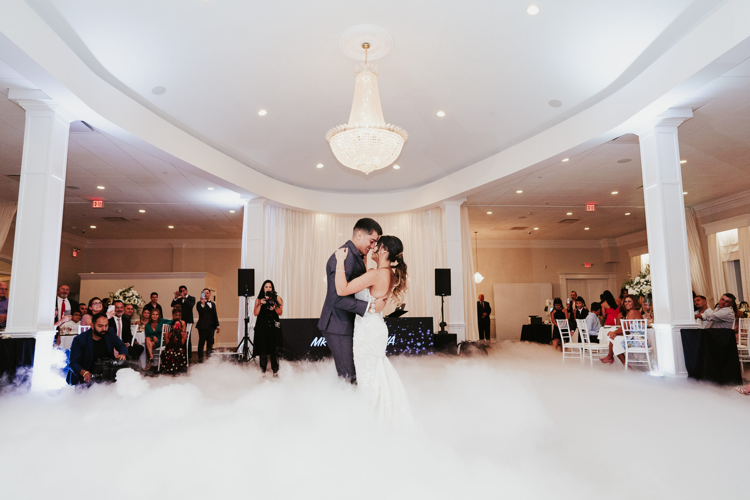 Bride and Groom Dancing in the Clouds at Avenir