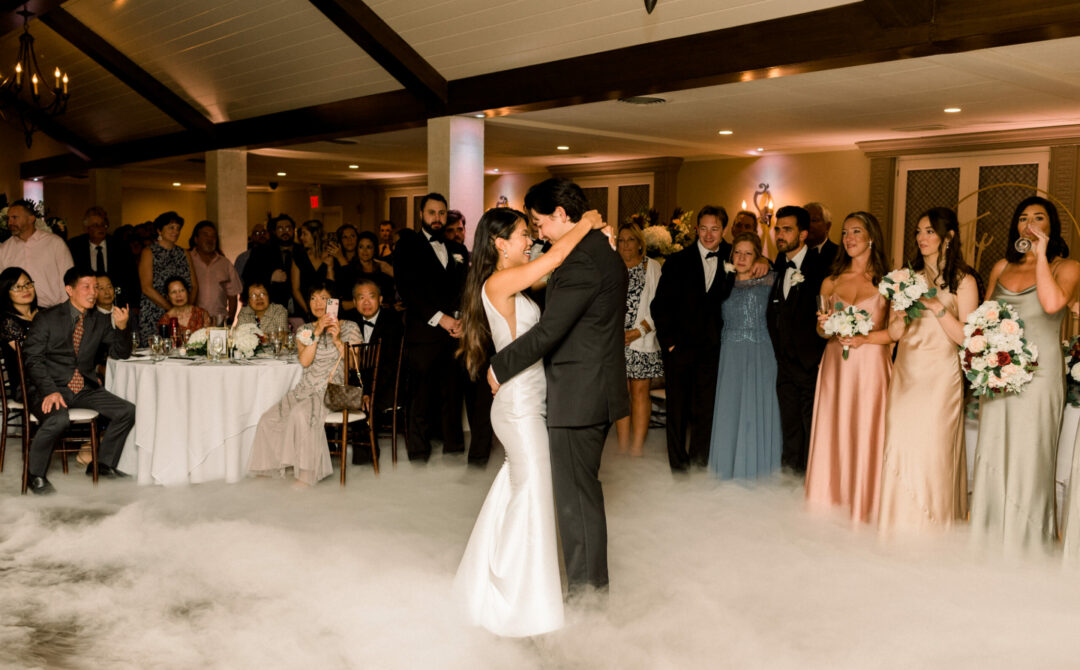 Bride and Groom First Dance in Rustic Ballroom