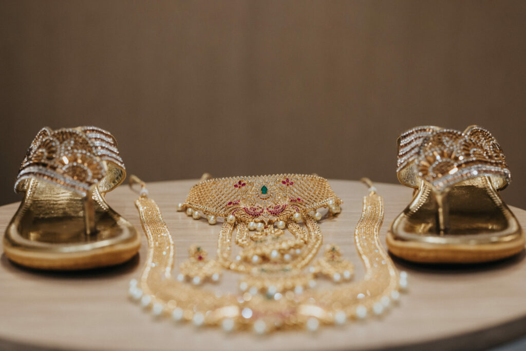 Gold Jewelry and Gold Sandals for Indian Wedding Ceremony at Avenir