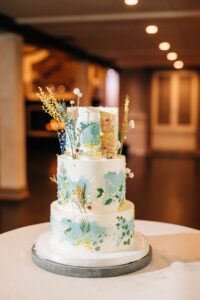Colorful Blue and Yellow Wildflower Wedding Cake for 2024 Wedding