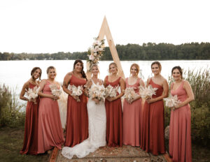 Peach Mismatched Bridesmaids Dresses at Waterfront Wedding Venue The Lakehouse in Massachusetts