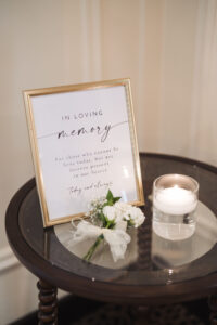 Memorial candle at a wedding used for decor and honoring loved ones