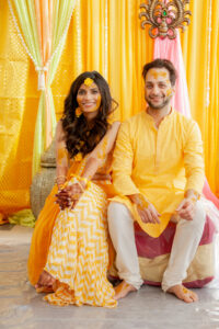 Indian Bride and Groom at Haldi Ceremony in Yellow Sari at Boston Apartment
