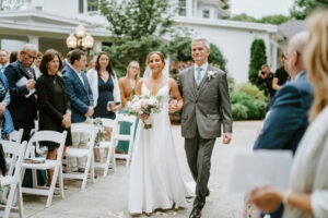 Father and Bride Walk Down the Ceremony Aisle at Her Massachusetts Wedding at Saphire Estate
