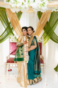 Indian Bride and Bridesmaids Wearing Green and Gold Saris at Saphire Estate in Sharon Massachusetts