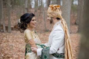 Indian Bride and Groom Embrace in Woods at Saphire Estate