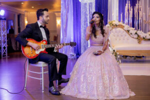 Indian Bride and Groom Sing and Play Guitar at Wedding Reception