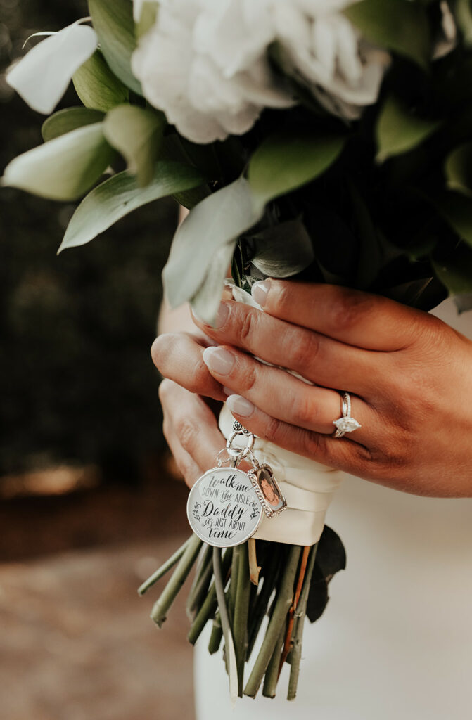 Bride Holding Bouquet With Memorial Charms for Dad