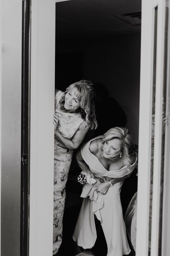 Documentary Wedding Photography With Moms Watching First Look