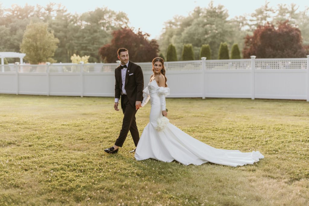 Bride and Groom Walking Sunset Portrait