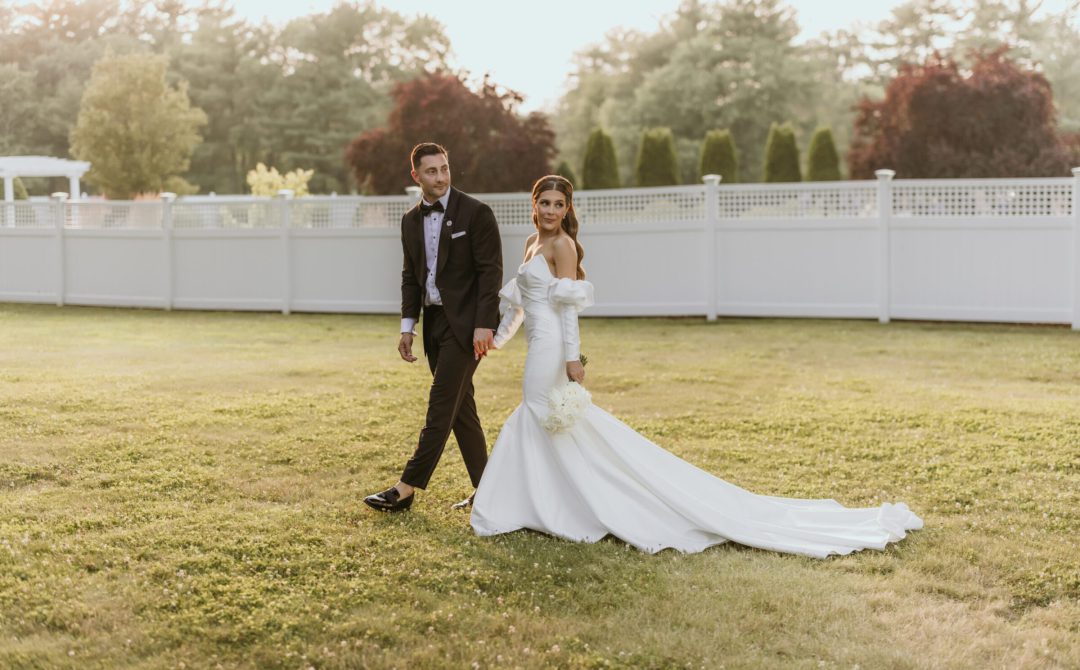 Bride and Groom Walking Sunset Portrait
