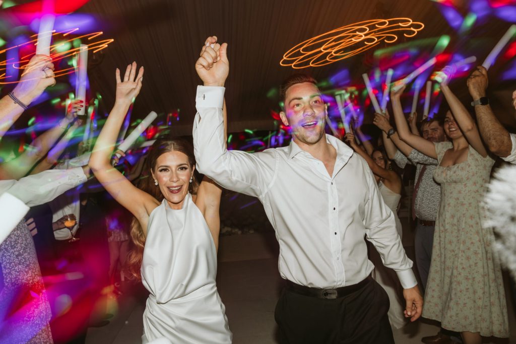 Bride and Groom Dancing at Reception in Tent