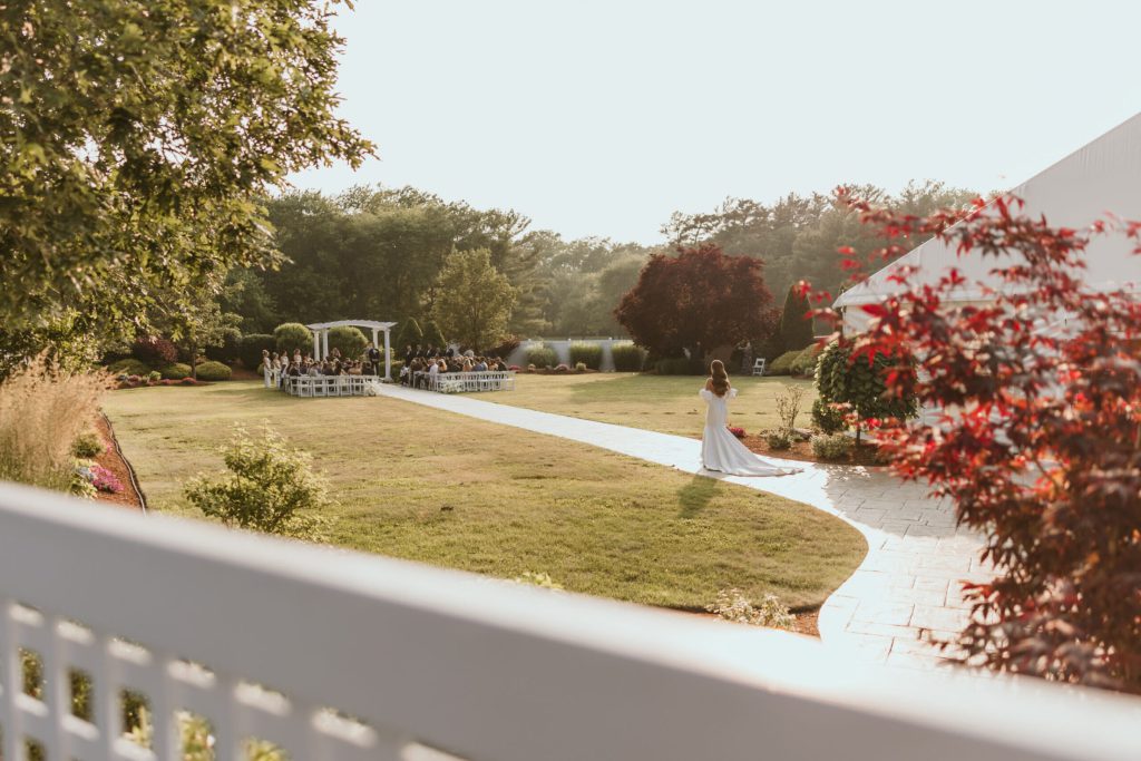 Bride Walking Down Aisle Wide Shot Golden Hour