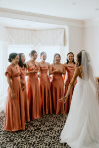Bride First Look With Bridesmaids in Saphire Estate Wedding Suite