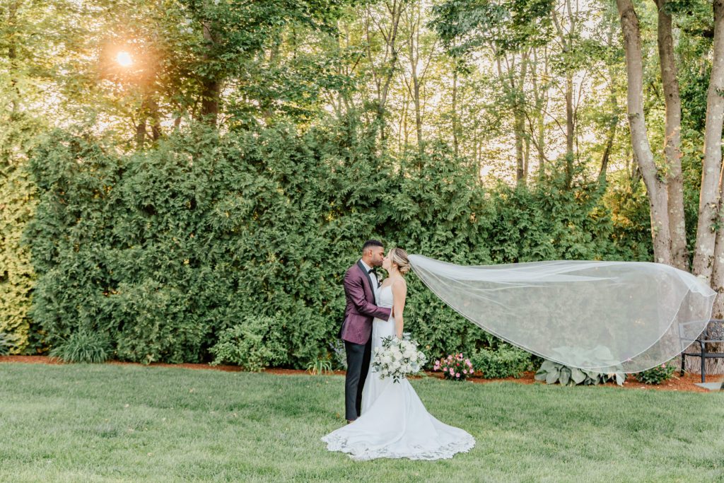 Bride and Groom Veil Blowing in the Breeze