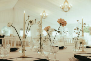 White Candles With Silver Accents and Florals 