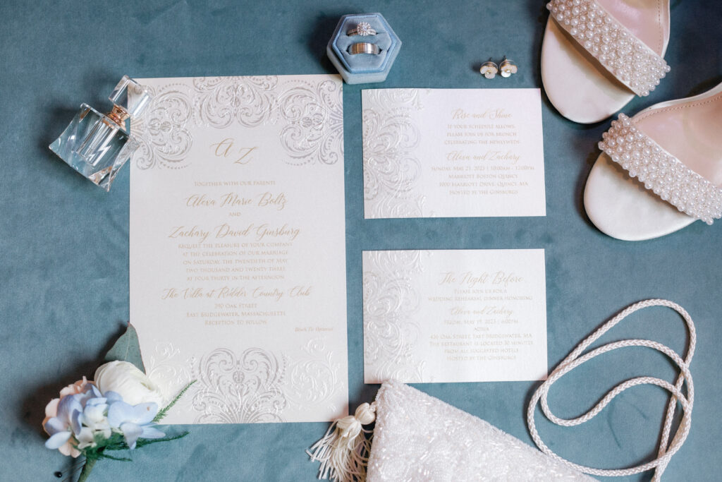 Dusty Blue and Gold Wedding Details Flatlay